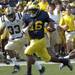 Michigan quarterback Denard Robinson charges toward the endzone for a long touchdown run during first quarter action of the Wolverine's 2009 season opener versus Western Michigan University, Saturday, September 5th at Michigan Stadium.
Lon Horwedel | Ann Arbor.com
